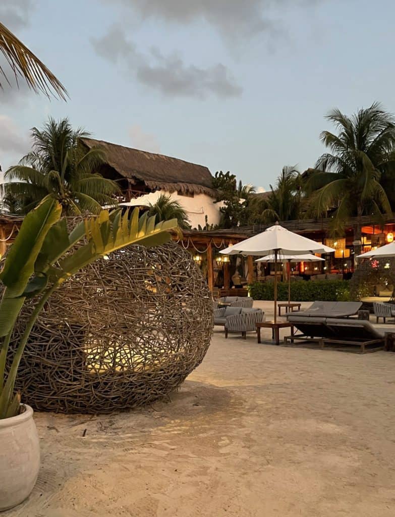 many unique seating options at a beach club in Holbox Beach