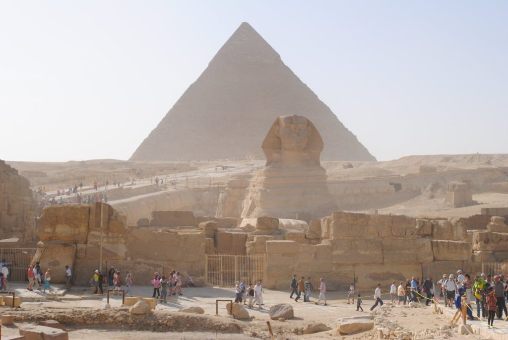 The Great Sphinx of Giza photographed alongside a Pyramid in Egypt 