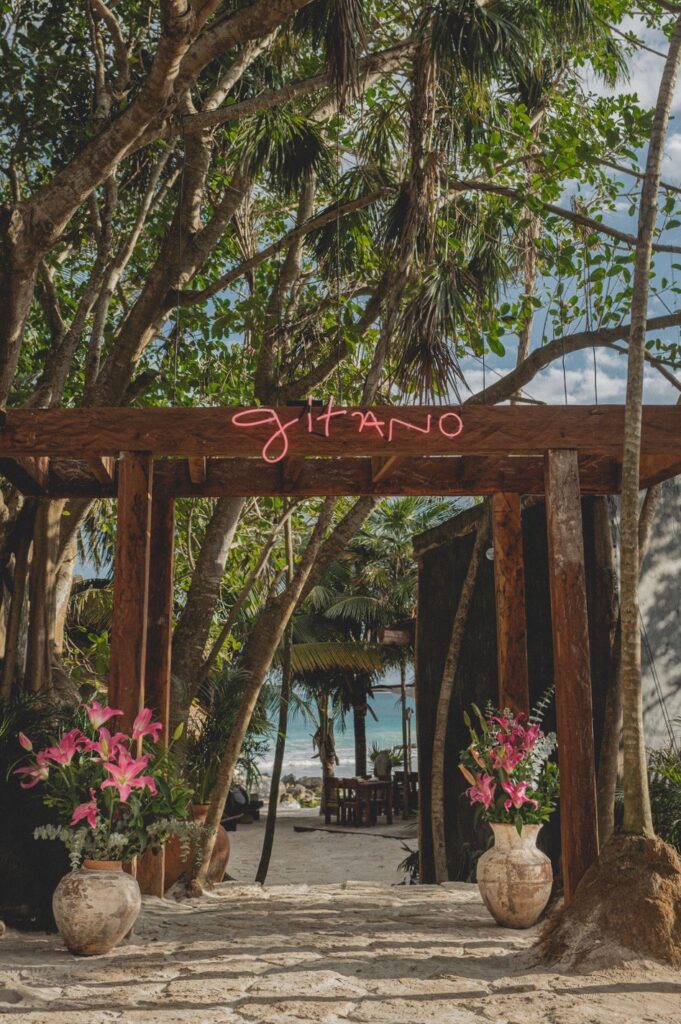 picture of gitano restaurant with the beach in the background in tulum mexico