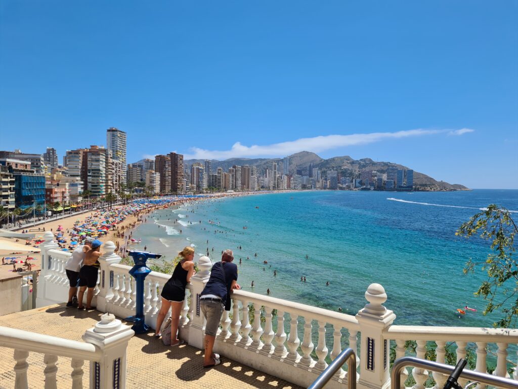 photo of the main beach in benidorm named levante beach crowded full of people at the beach