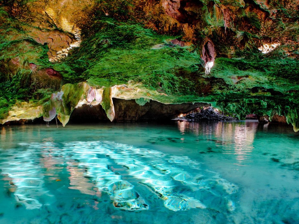 two eyes cenote clear blue waters underground