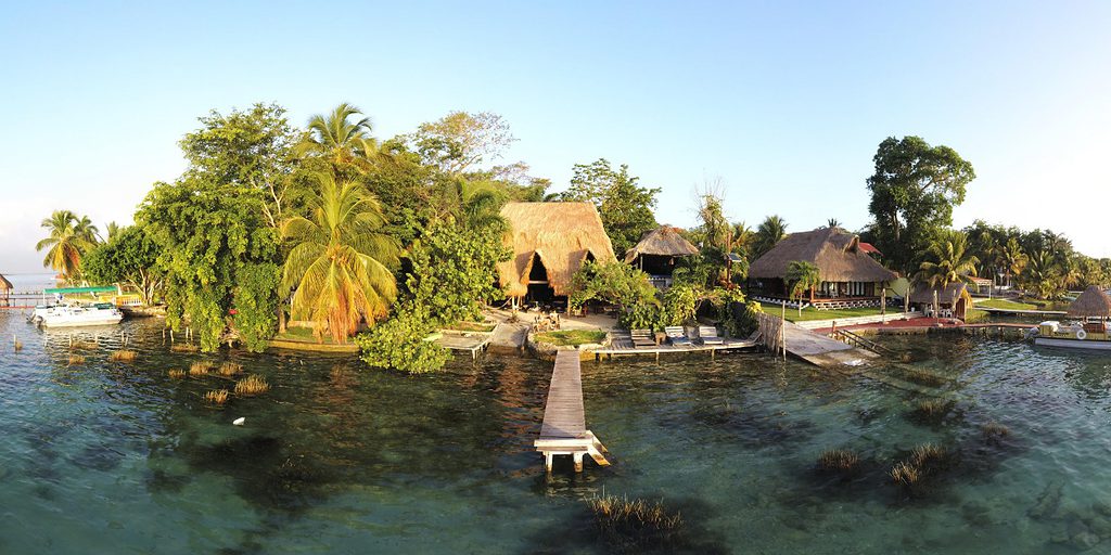 view of the Posada Lulu la bruja hotel from the Bacalar Lagoon