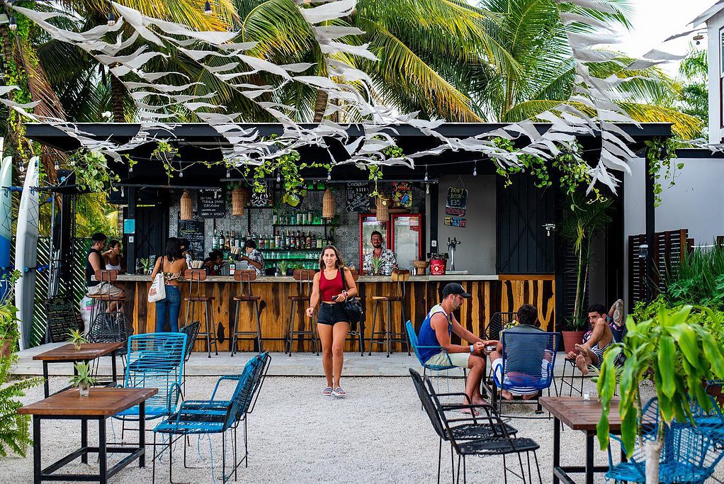 the courtyard and bar area at The Yak House Bacalar