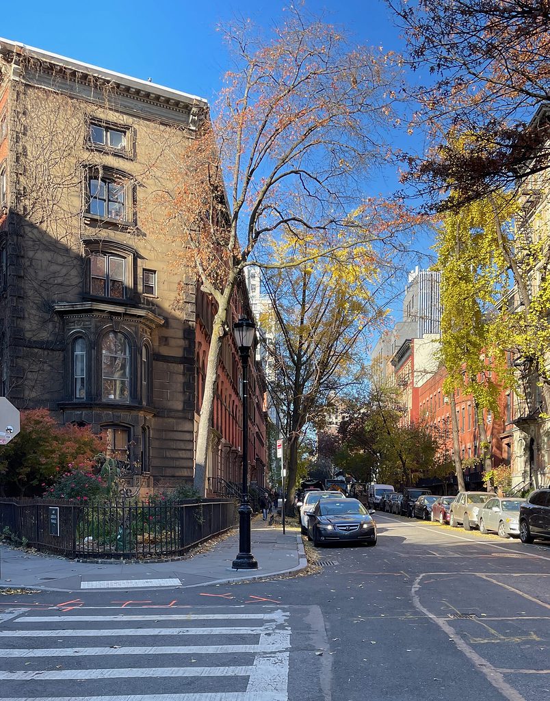 an empty street in the neighborhood-like Greenwich Village, Where to stay in NYC