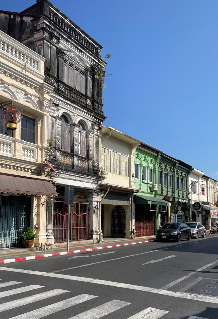 empty street full of colourful Portuguese style buildings in Phuket Old Town