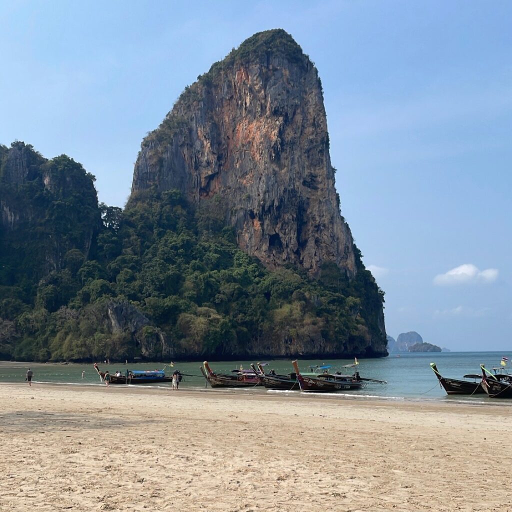 long tail boats docked at Railay beach on the west of the island