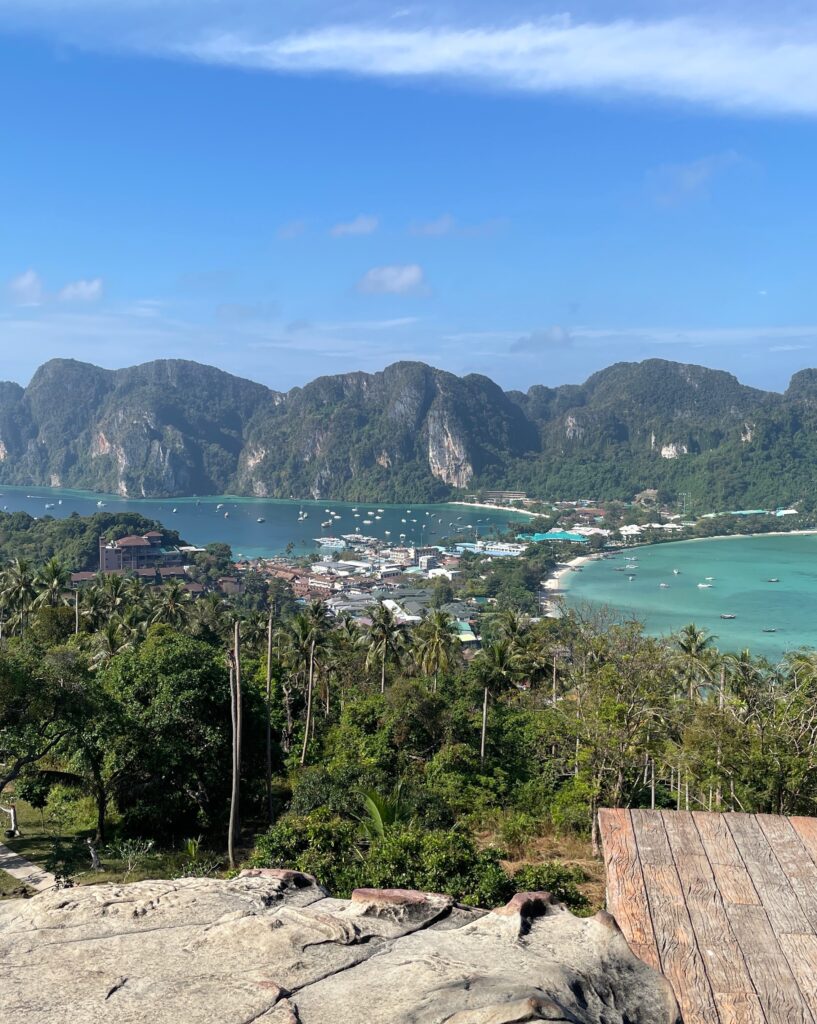observation deck at Viewpoint 2 in Phi Phi, showing the entire island of Phi Phi don, luscious green mountains in the backdrop and the sea from both sides of the island