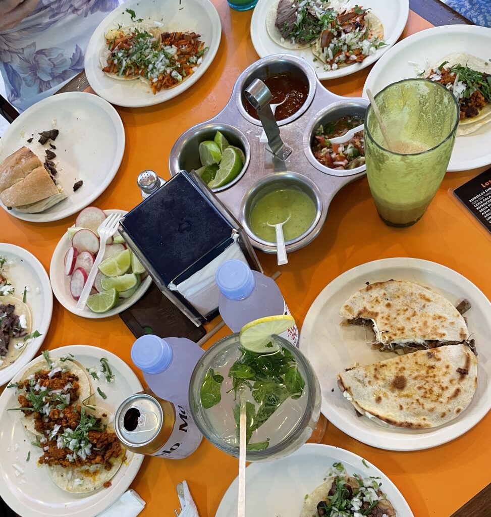 several Mexican dishes such as tacos, gringas, tortas and more being served at El Fogon restaurants in Playa del carmen