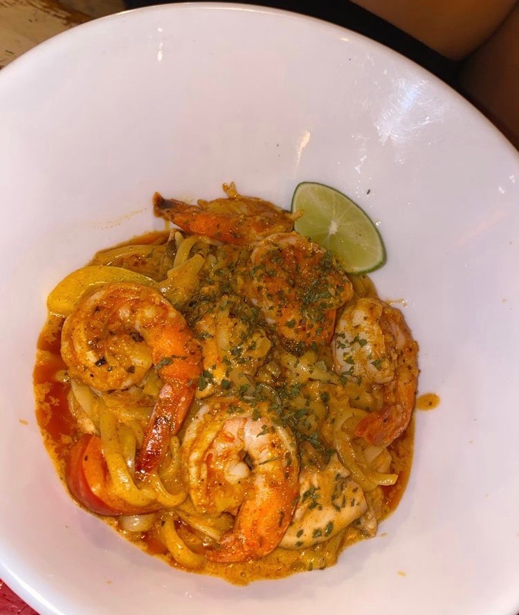 the famous rasta pasta dish at Rockas Jamaican Kitchen in Playa Del Carmen