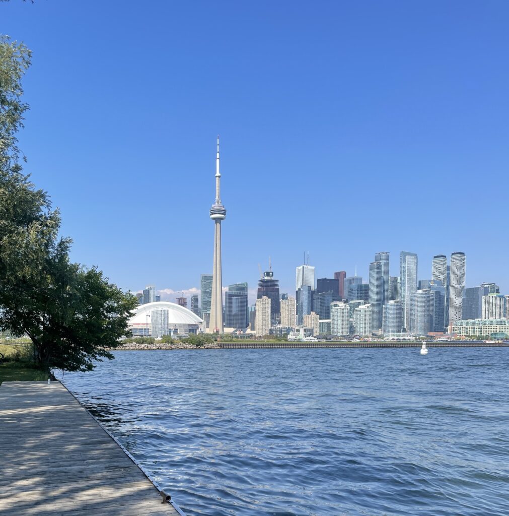 views of the skyline of Toronto, Canada, featuring the famous CN Tower from Toronto Island