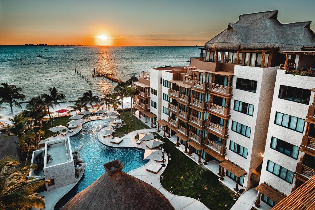 aerial views of the beautiful Hotel Belo Isla Mujeres during sunset