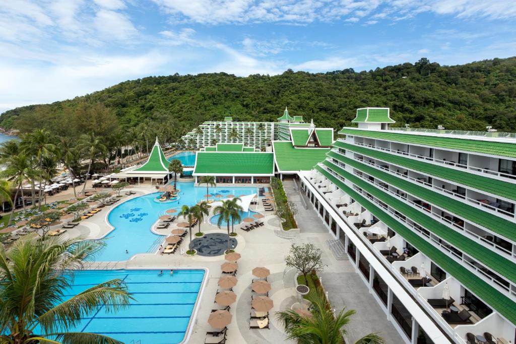 aerial views of the pools and private beach at Le Meridien Phuket Beach Resort in Karon Phuket