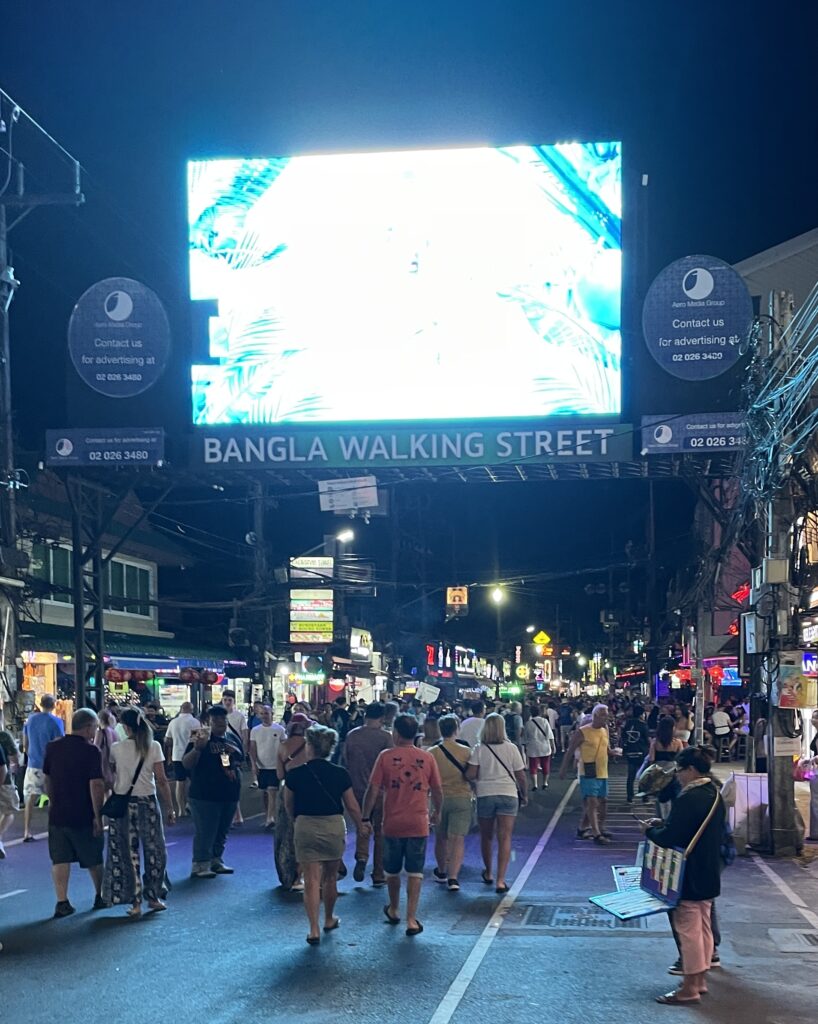 several tourist walking the famous Bangla Road in Patong full of it's notorious nightlife