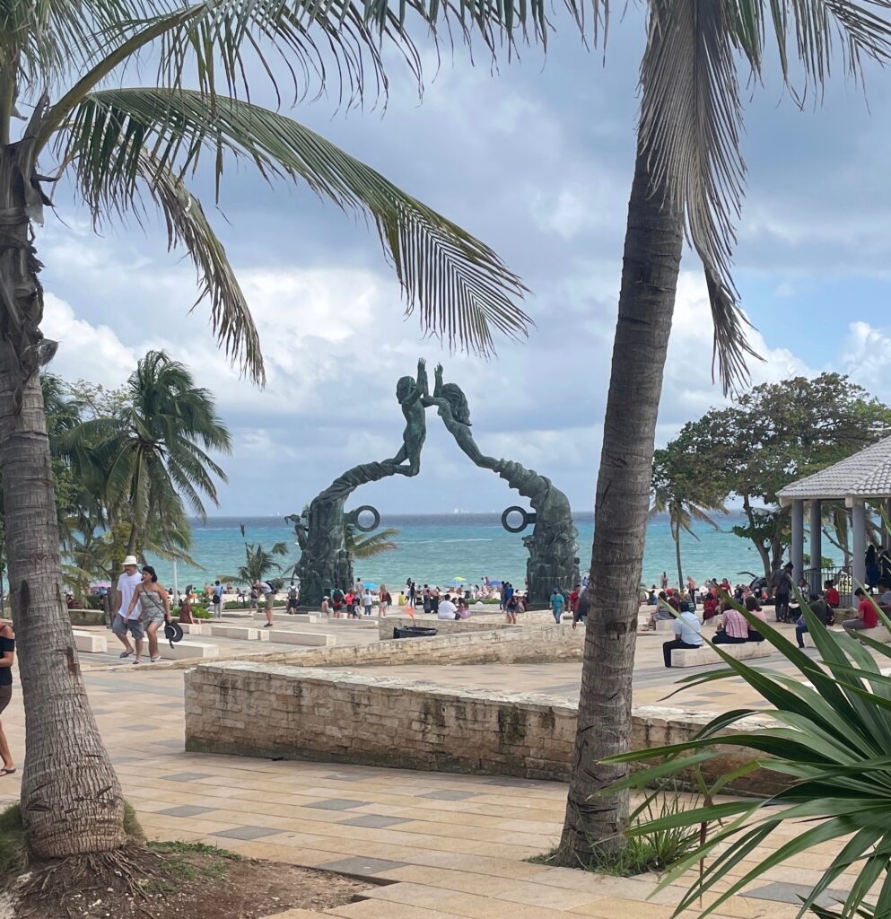 Playa Del Carmen famous waterfront area features the well-known mermaid statue