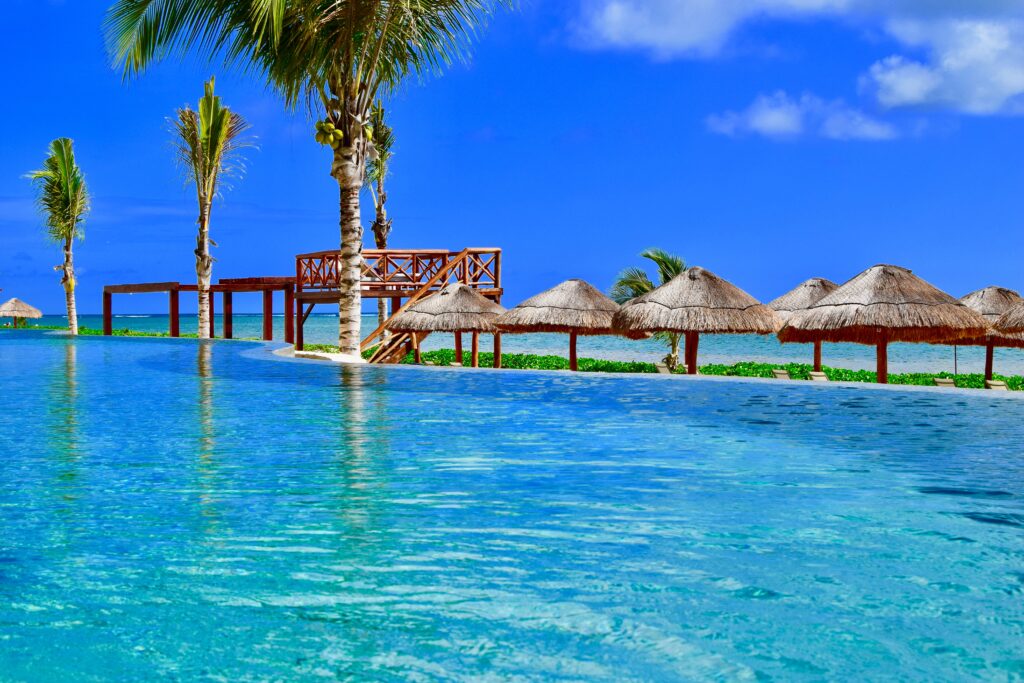 several palpas stationed at an empty beach in Puerto Morelos, Mexico