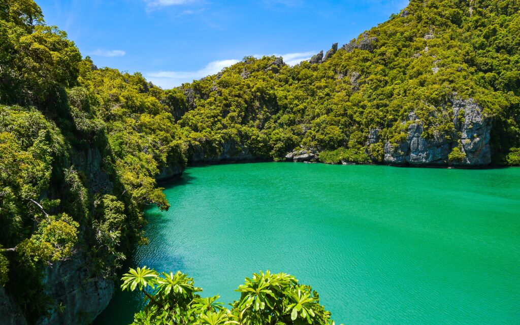 luscious green filled mountains along the water at Ang Thong Marine Park in Koh Samui