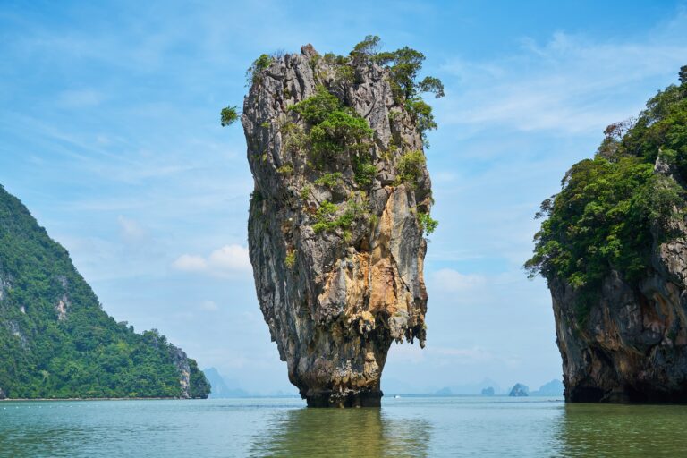 the famous James Bond Island standing isolated in the waters of Phang Nga Bay in Thailand