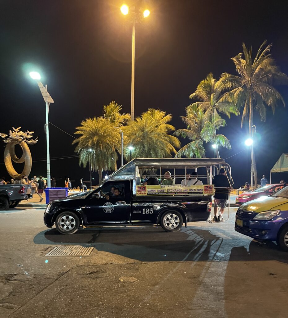 a local Pattaya songtaew truck driving around the city