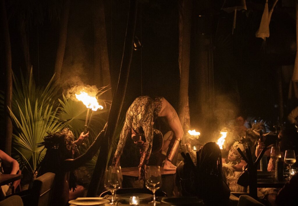 traditional fire Mayan performance featuring fire, dancers and acrobatics taking place at Bak Steakhouse Tulum 