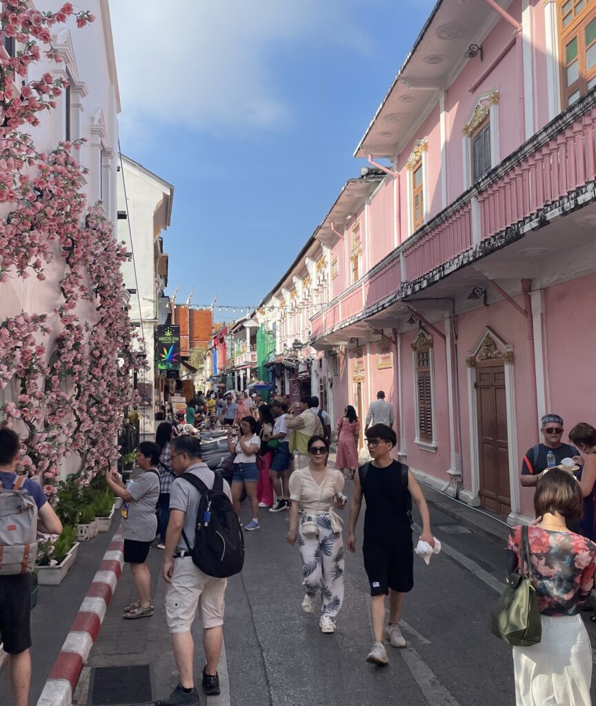 beautiful bright pink Sino-Portuguese buildings in the streets of Old Phuket Town, Thailand