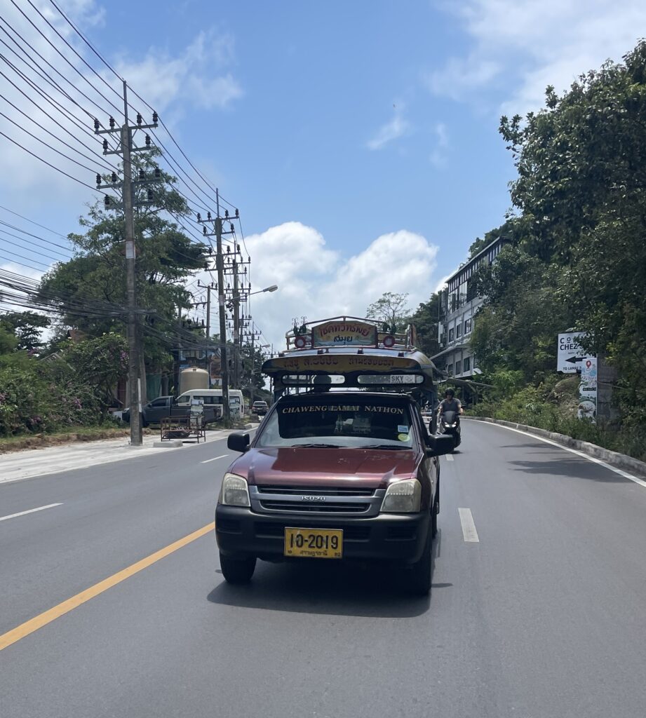 song taew, a pubic transportation taxi van driving throughout Koh Samui, Thailand