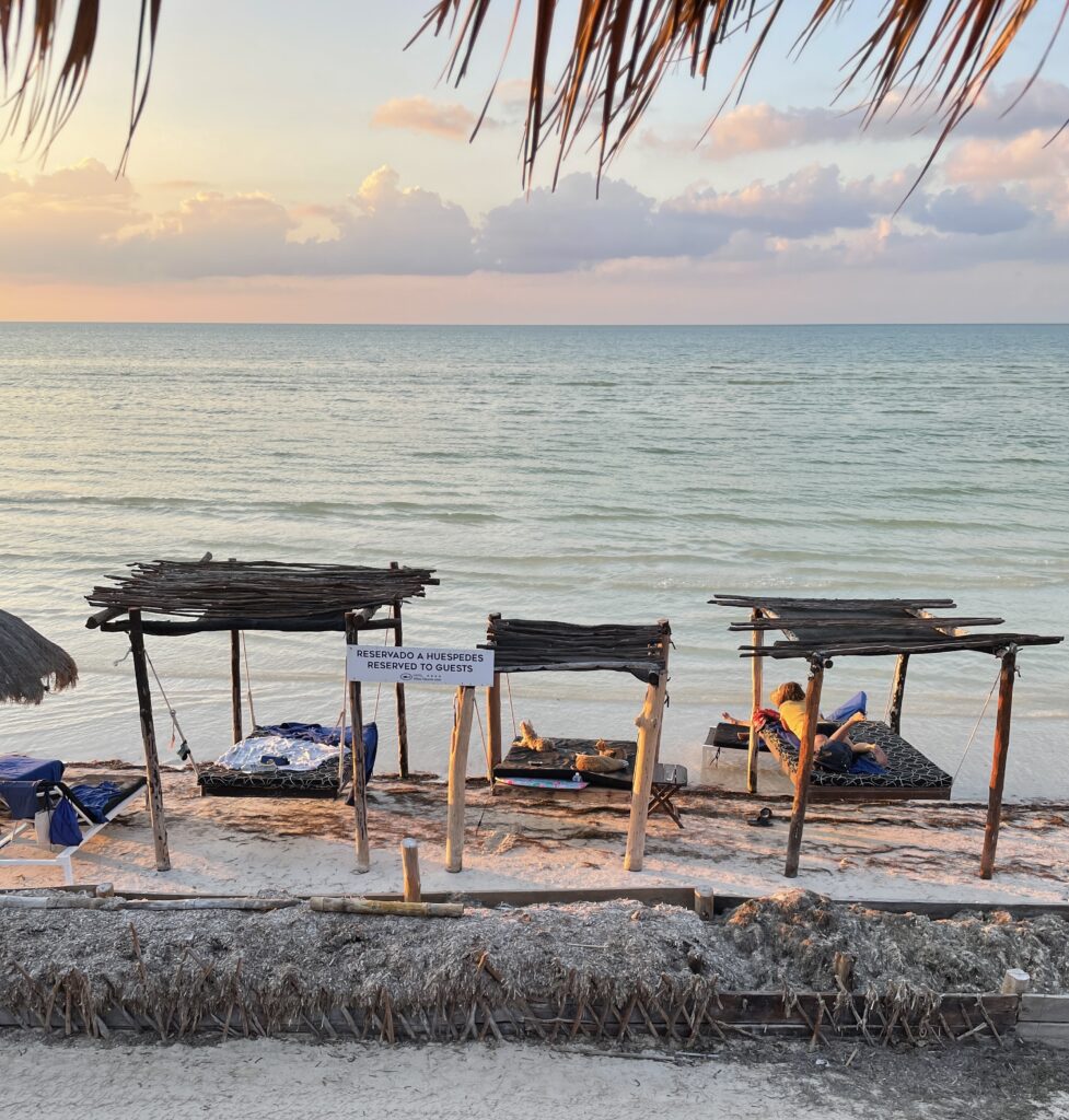 Cotton candy skies among the calm waters at the main beach in Isla Holbox. Mexico / Is Holbox Expensive to visit