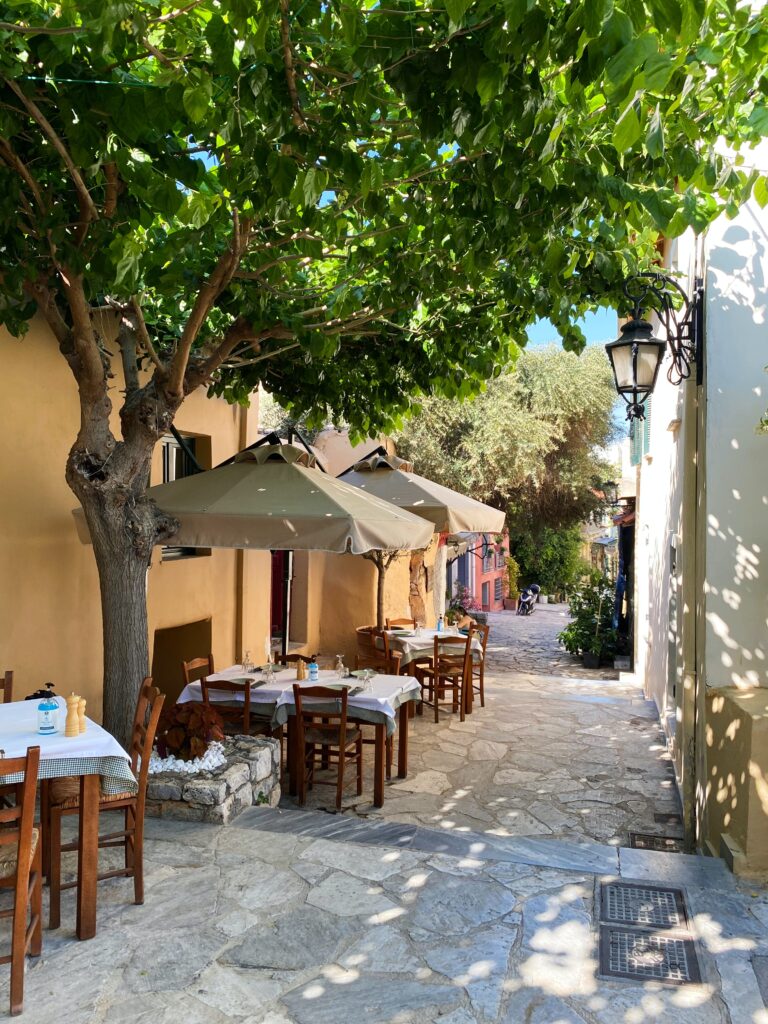 a small nice cafe on a quiet side street in Athens, Greece