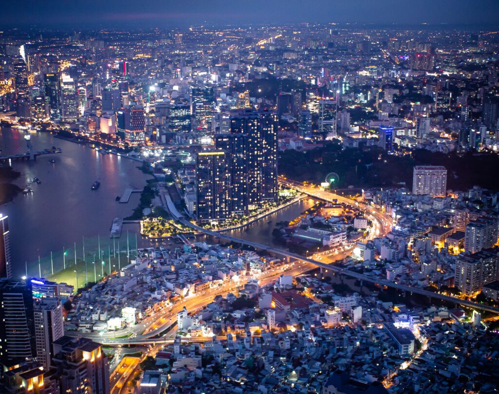 aerial views at night of the brightly lit-up skies of Ho Chi Minh City, VIetnam