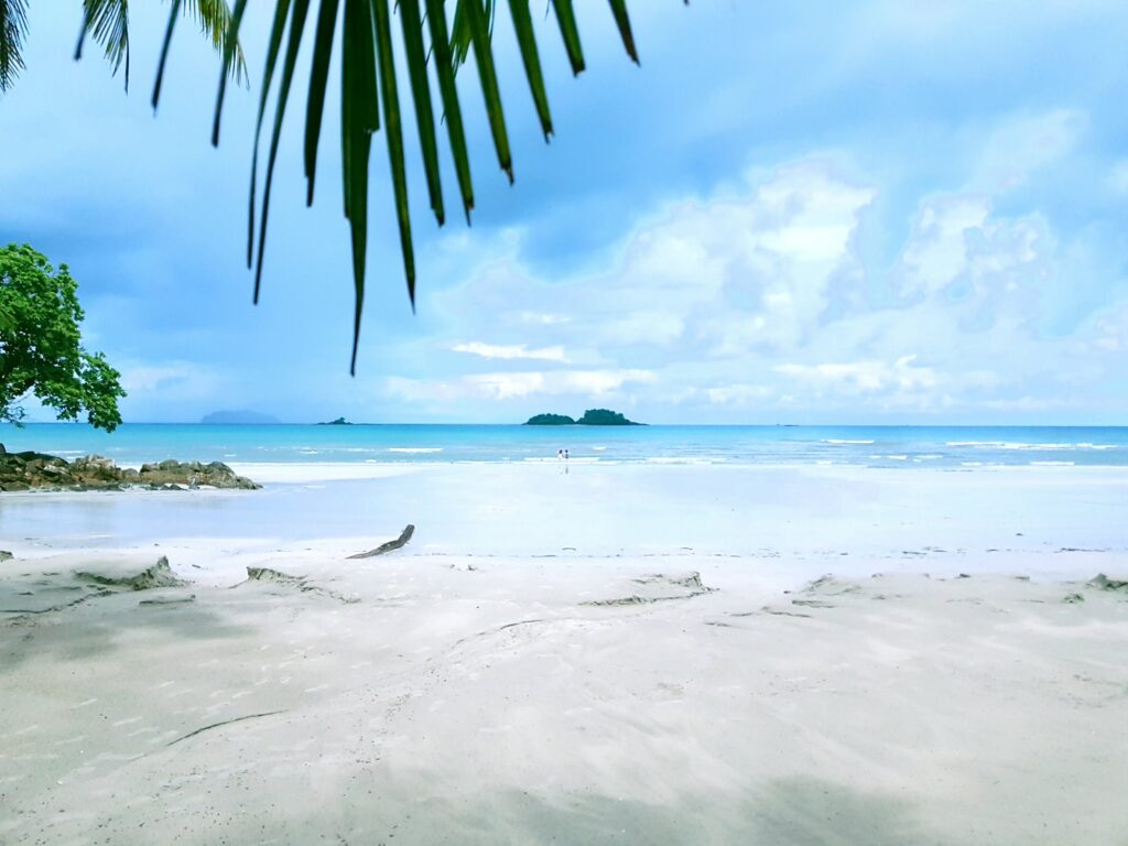crystal clear water on a white sandy beach in Koh Chang