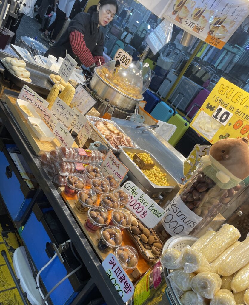 several sweets being sold by a vendor at the night market in Myeongdong 