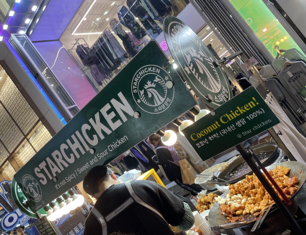 popular Korean fried chicken vendor selling his chicken at the Myeongdong Night Market 