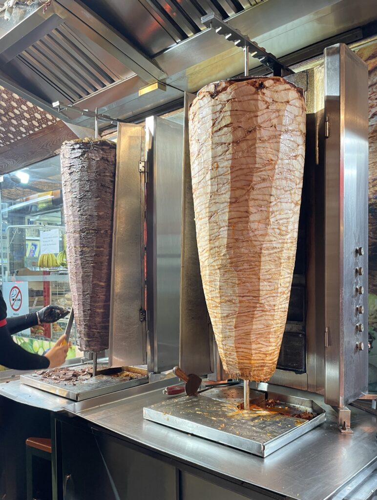 two massive meat spits rotating at Halab Shawarma in Kuala Lumpur