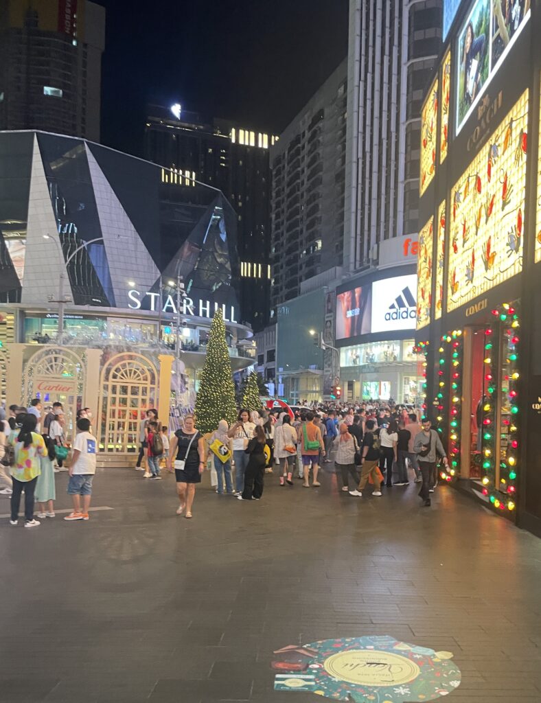 several crowds at the entrance of the Pavillion Mall in Kuala Lumpur