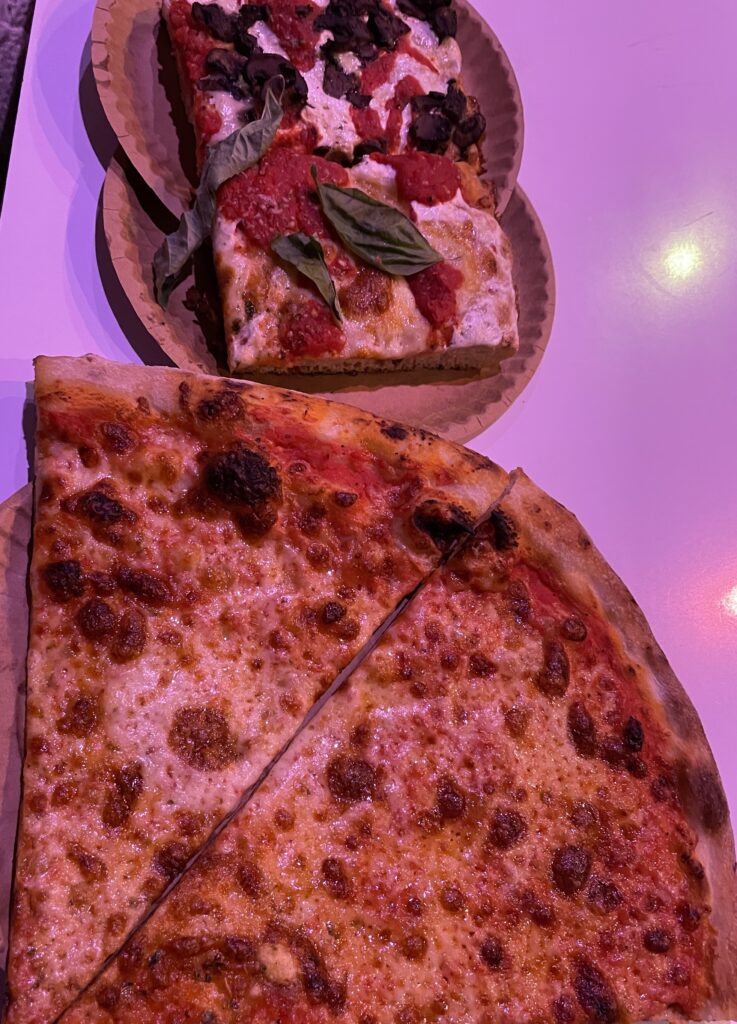 two types of pizza slices served at Scarrs pizza in New York City 