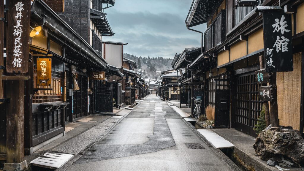 a charming historic street featuring decades old buildings in Takayama, Japan