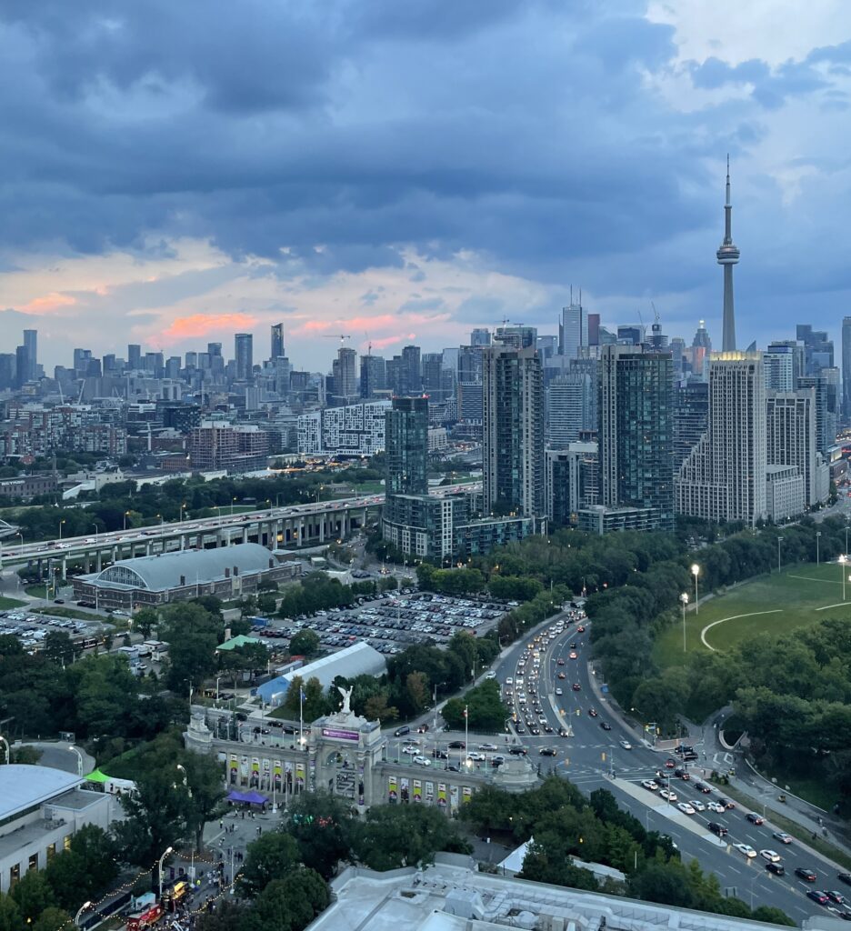 stunning rooftop views of Toronto skyline during sunset on a Summer night 