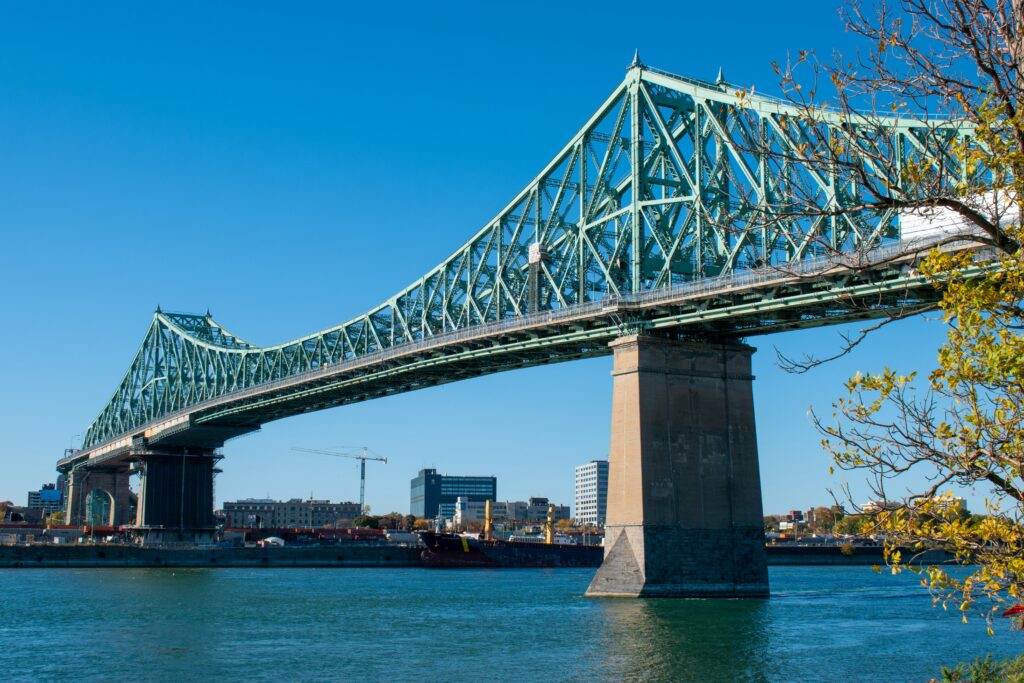 a bridge leading traffic to other parts of Montreal over the river 