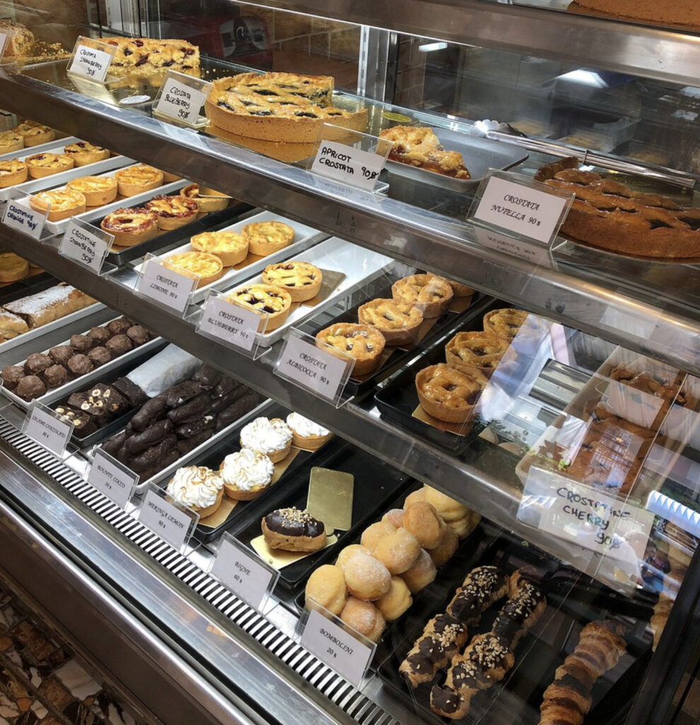 a wide selection of delicious baked goods on display at Dolci Delzi Bakery/deli in Kata Beach, Phuket 