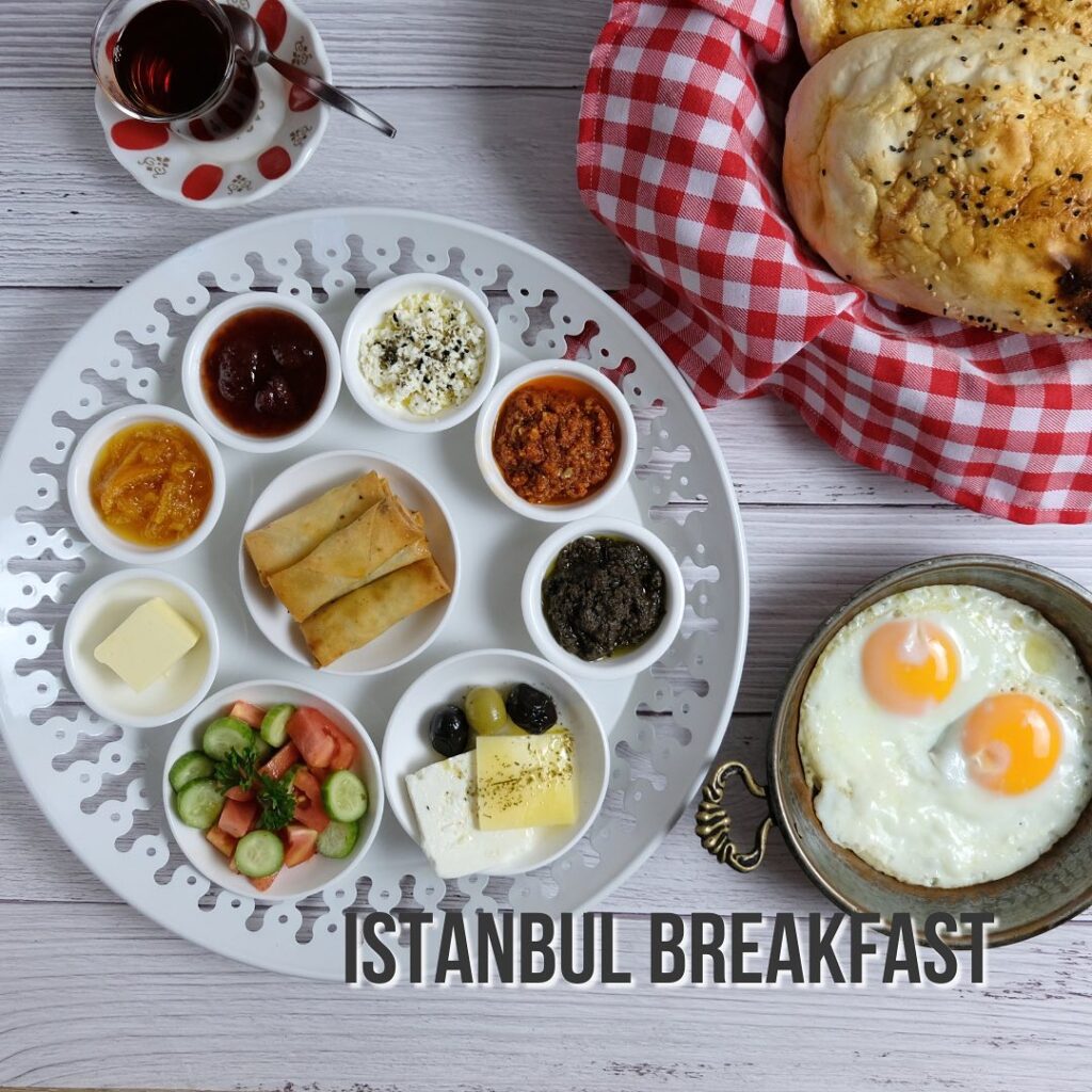 traditional Turkish breakfast spread out on a table featuring fresh veggies, dips, eggs, and bread 