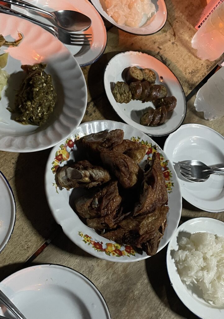 crispy fried chicken with sticky rice, isaan sausage at Midnight Chicken in Chiang Mai