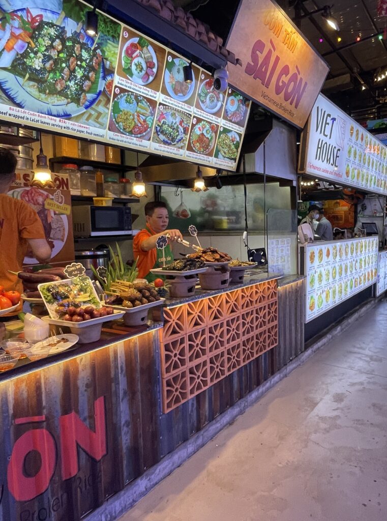 the Saigon Vietnamese street food stall at the Ben Nghe Food Market with many of it's delicious foods up for display 