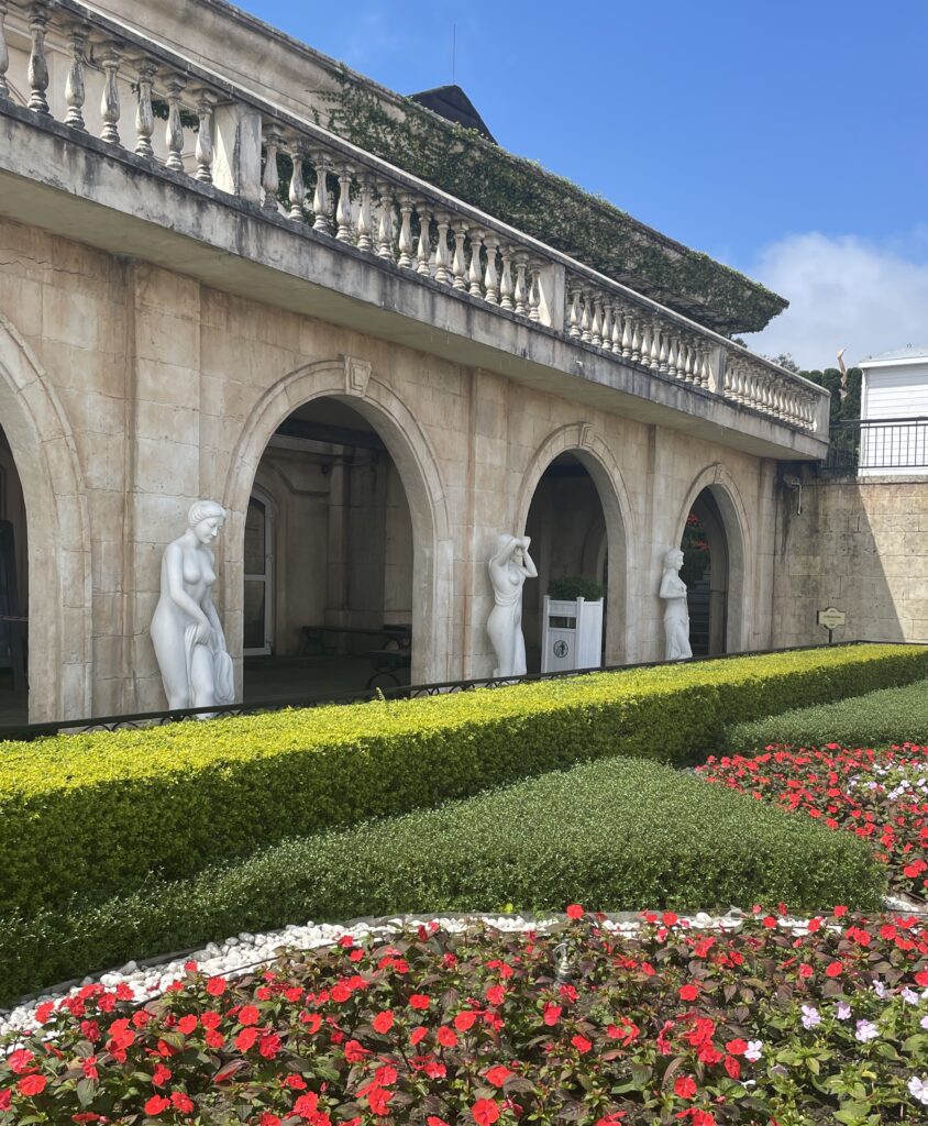 floral gardens among statues on a sunny day at the Ba Na Hills in Da Nang