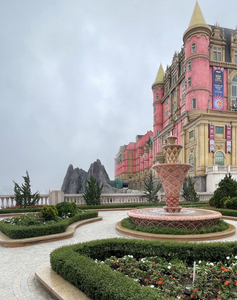 a bright prink castle at the Ba Na Hills 