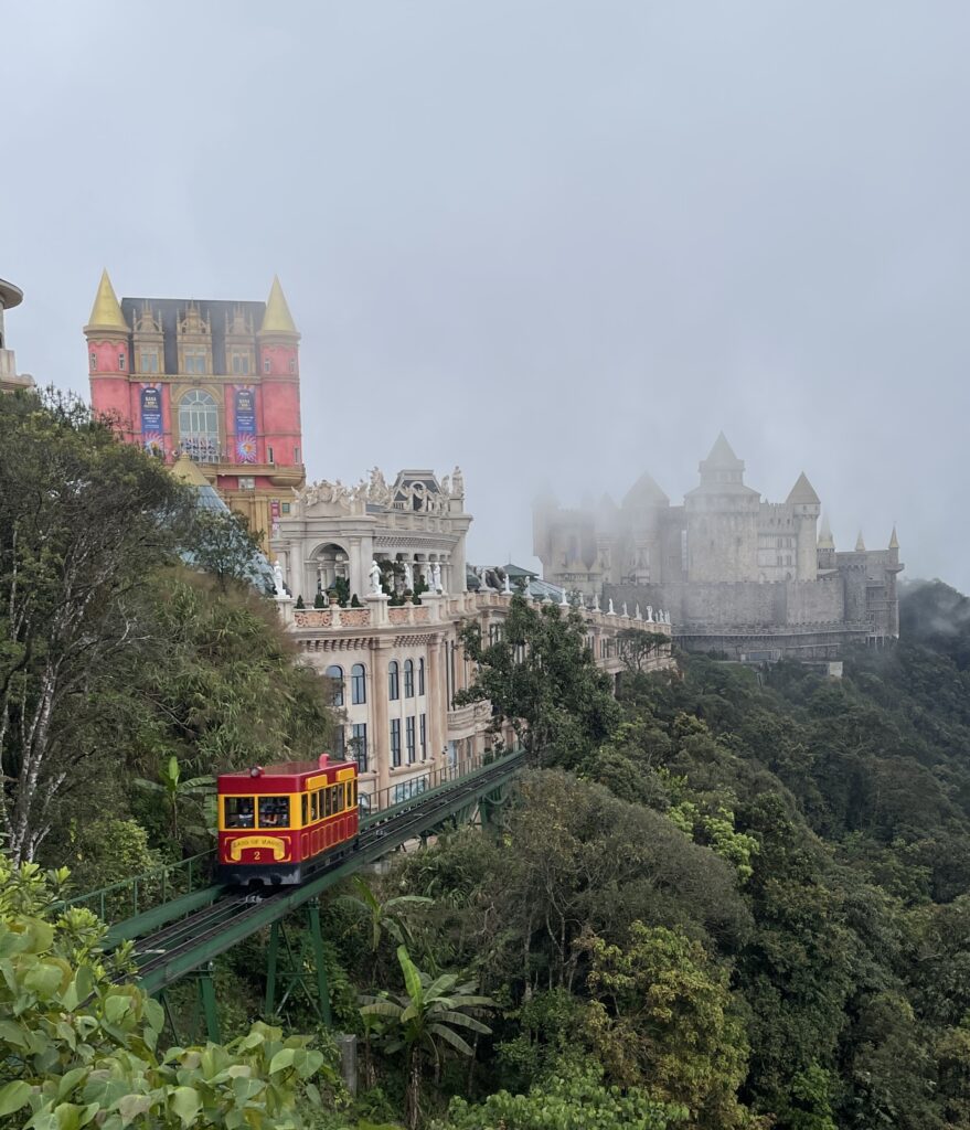 a train carrying passengers in the Ba Na Hills in misty weather 