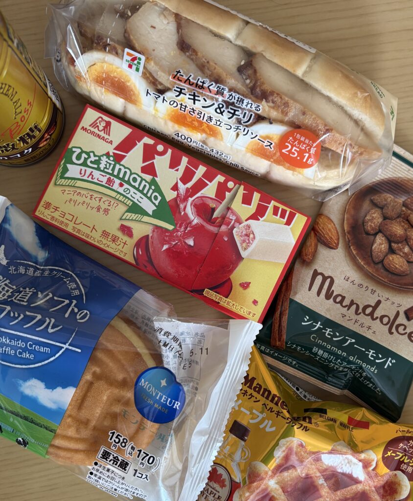 Egg and chicken sandwich alongside an assortment of popular Japanese snacks from 7-Eleven