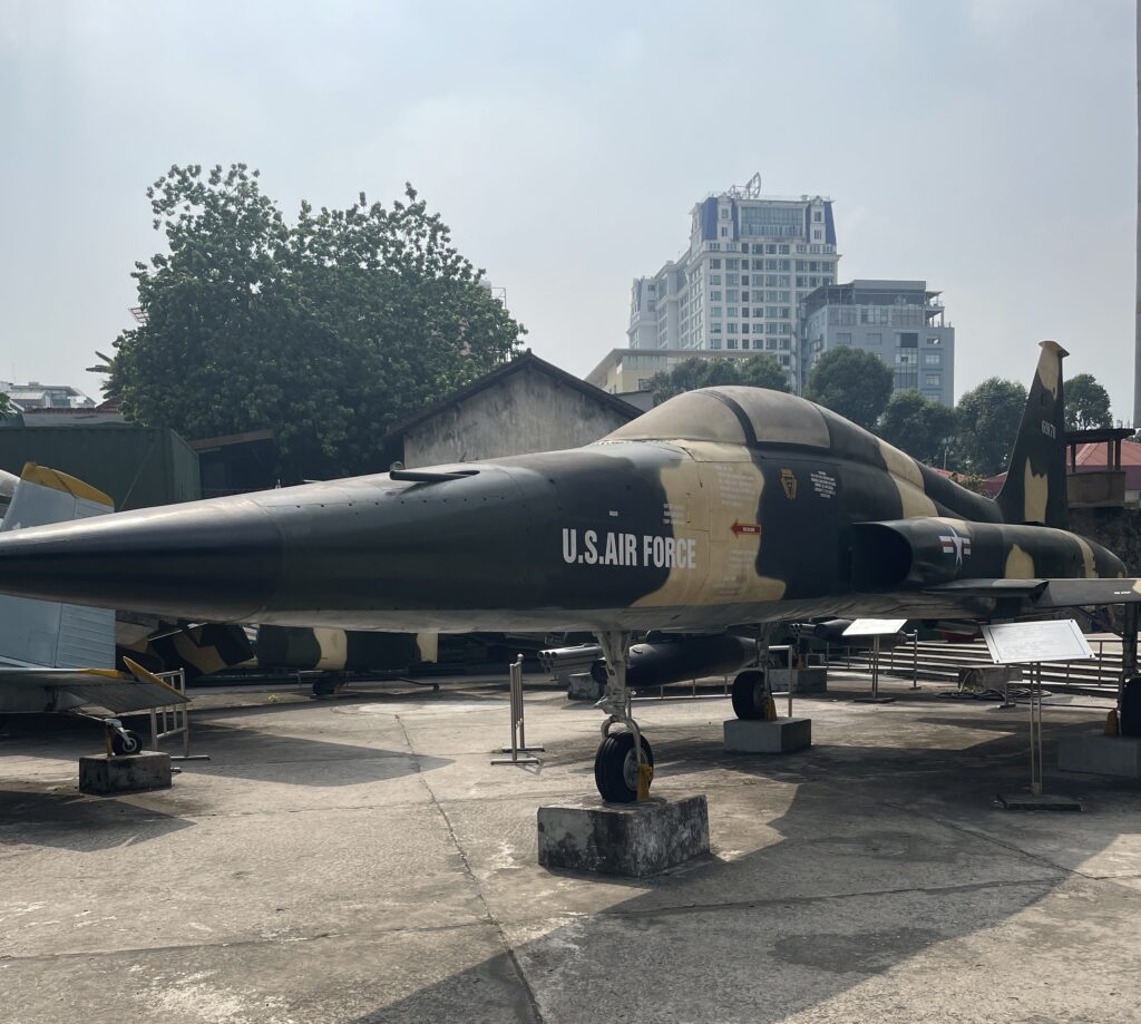 Retired US military aircraft displayed outdoors at the War Remnants Museum in Ho Chi Minh City, Vietnam.