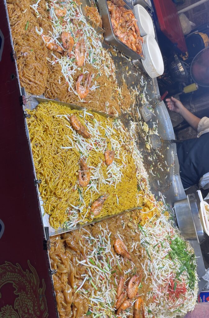 Three different noodle dishes served at Chiang Mai Sunday Night Market