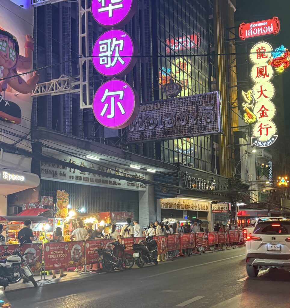 Food stalls along Yaowarat Road at Chinatown Night Market in Bangkok