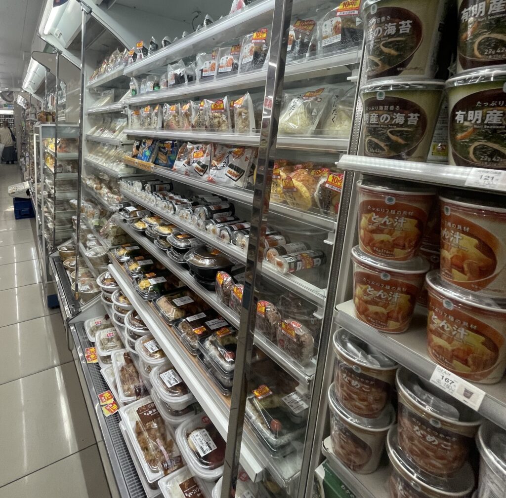 Assorted sushi, soup, and ready-to-eat meals at a Family Mart convenience store in Tokyo, Japan.