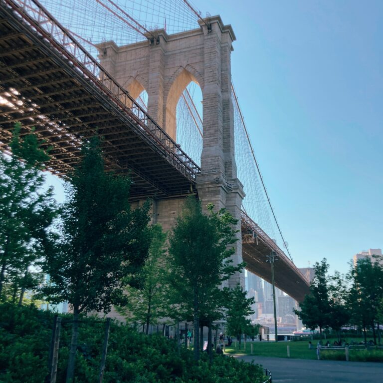 Stunning upward view of the Brooklyn Bridge from the Brooklyn side in New York City